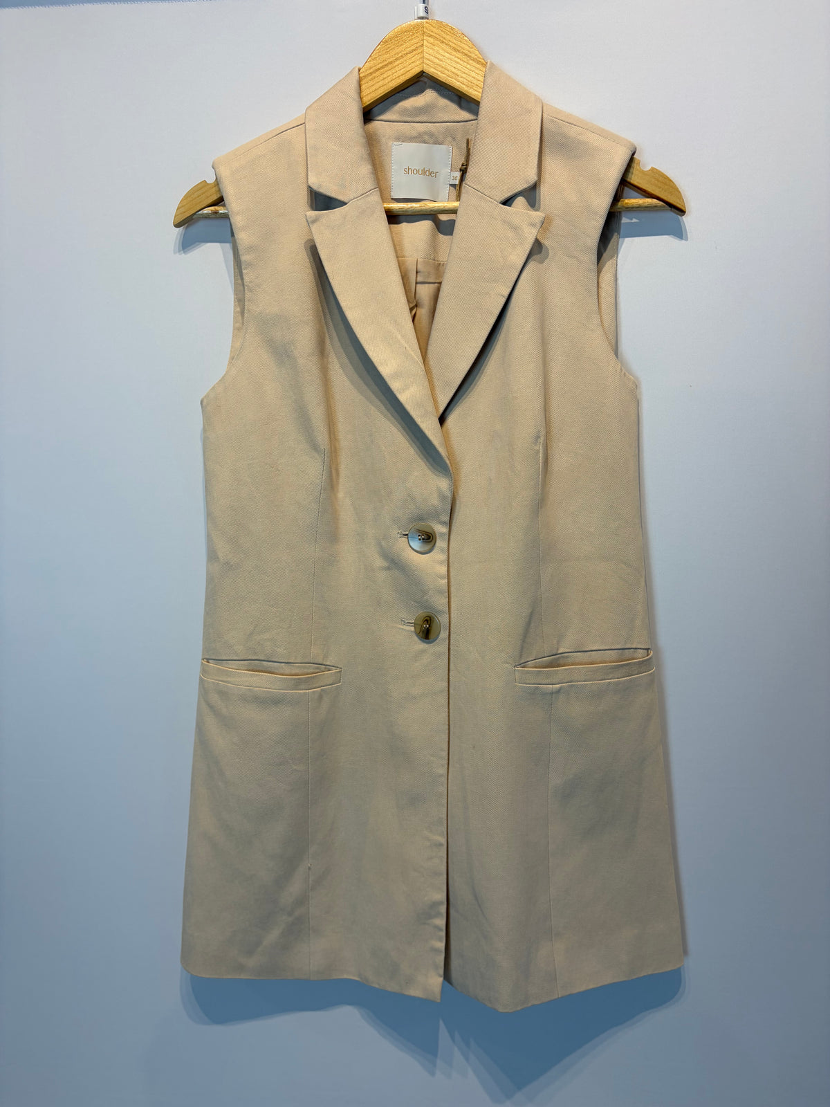 Shoulder · Colete longo