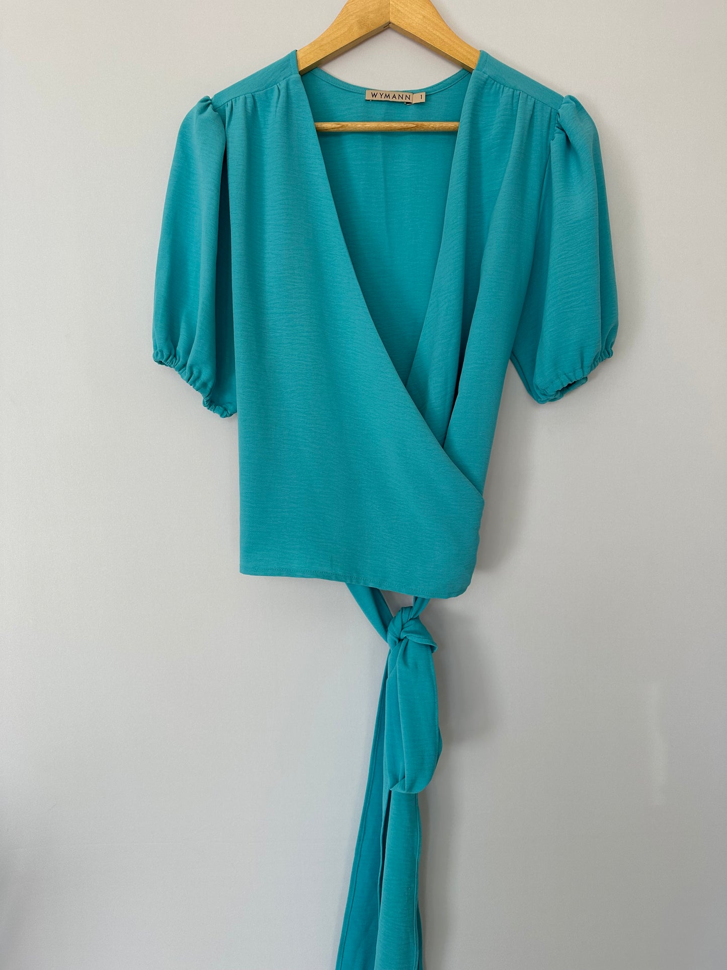 Wymann · Blusa transpassada mangas bufantes