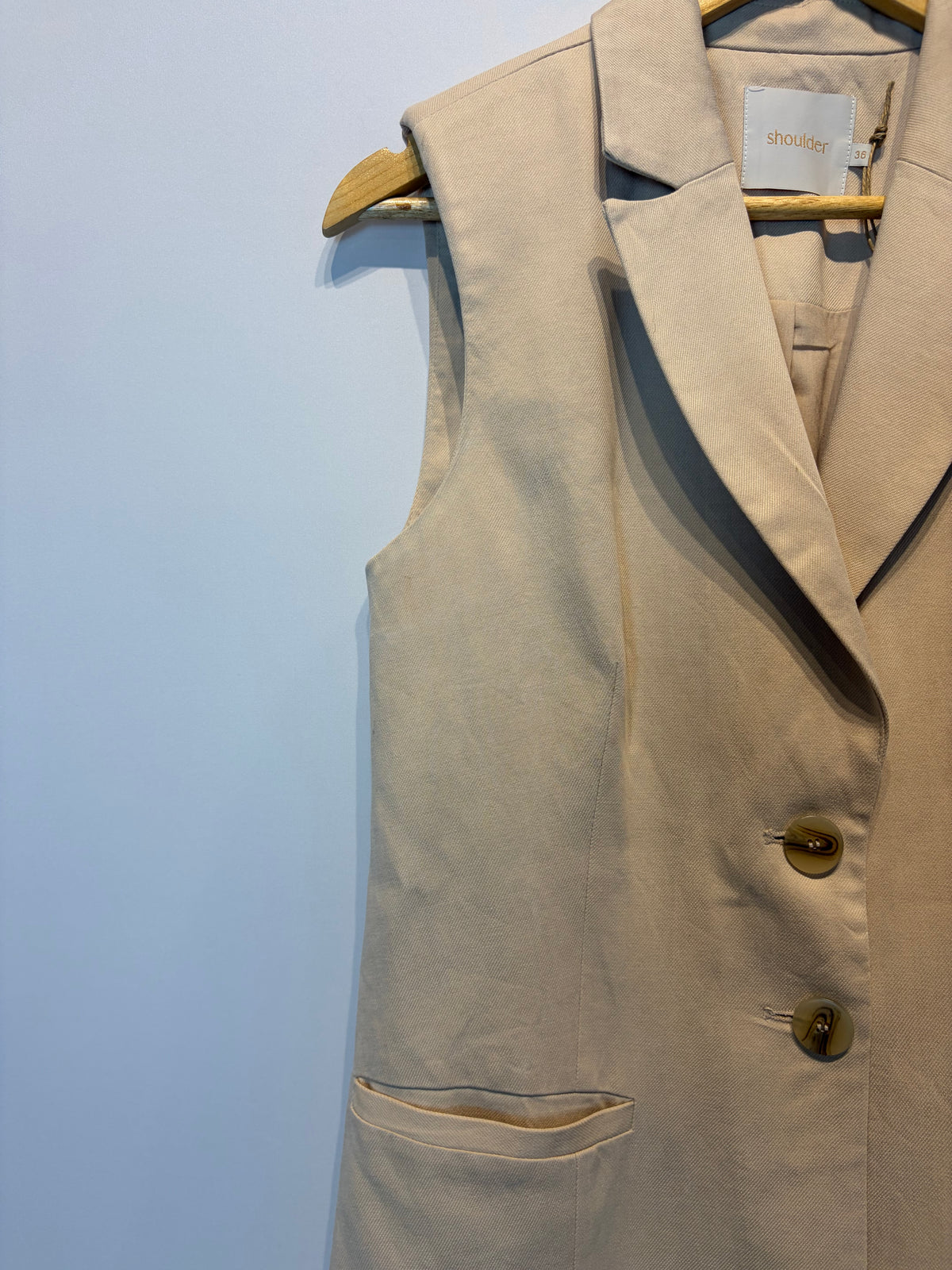 Shoulder · Colete longo