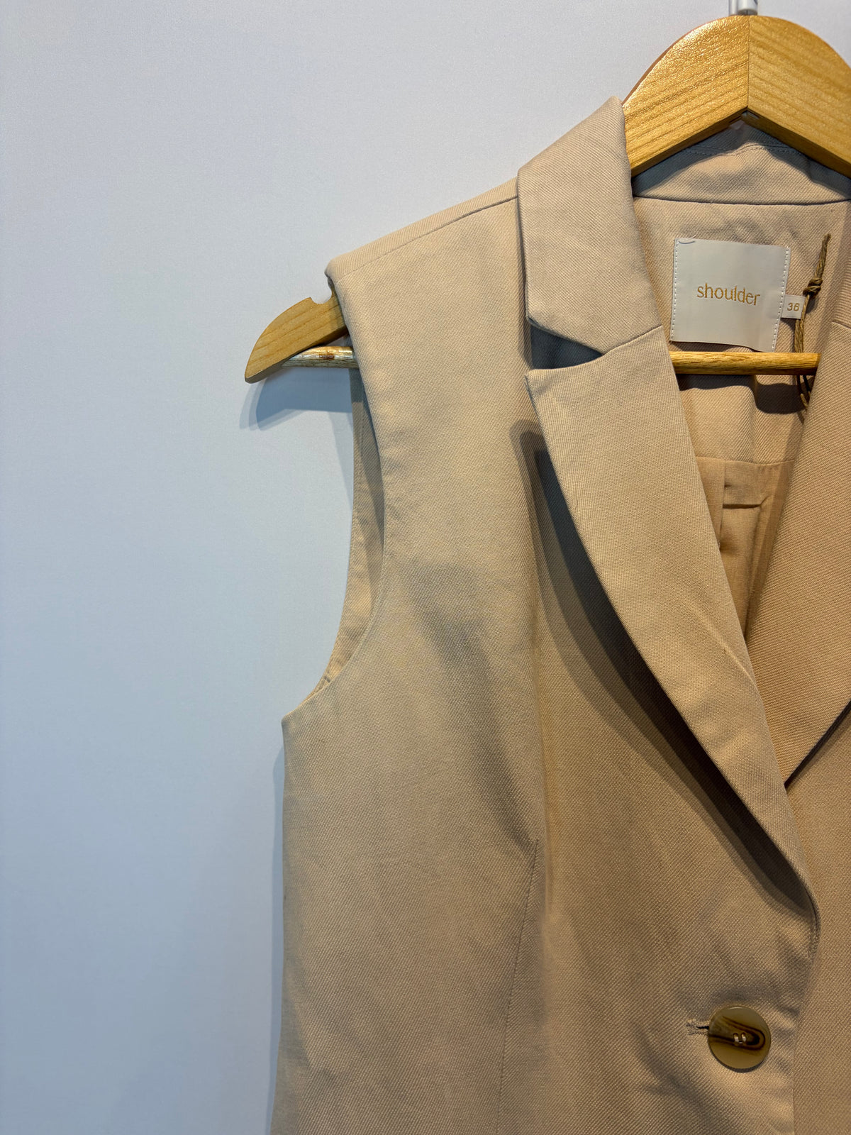 Shoulder · Colete longo