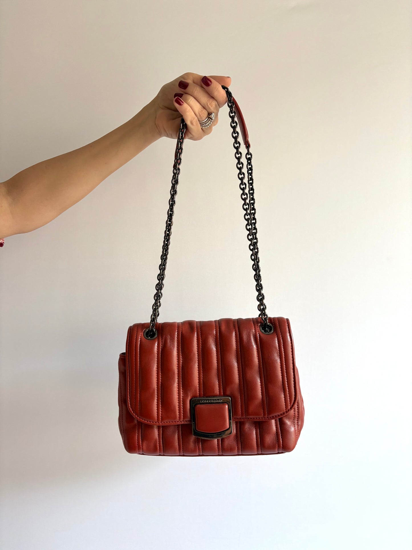 Longchamp · Bolsa matelassê vinho