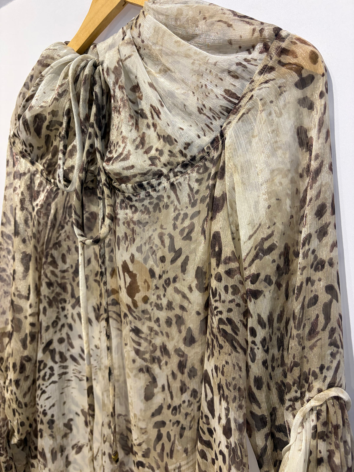 Tonâge · Blusa com manga longa animal print